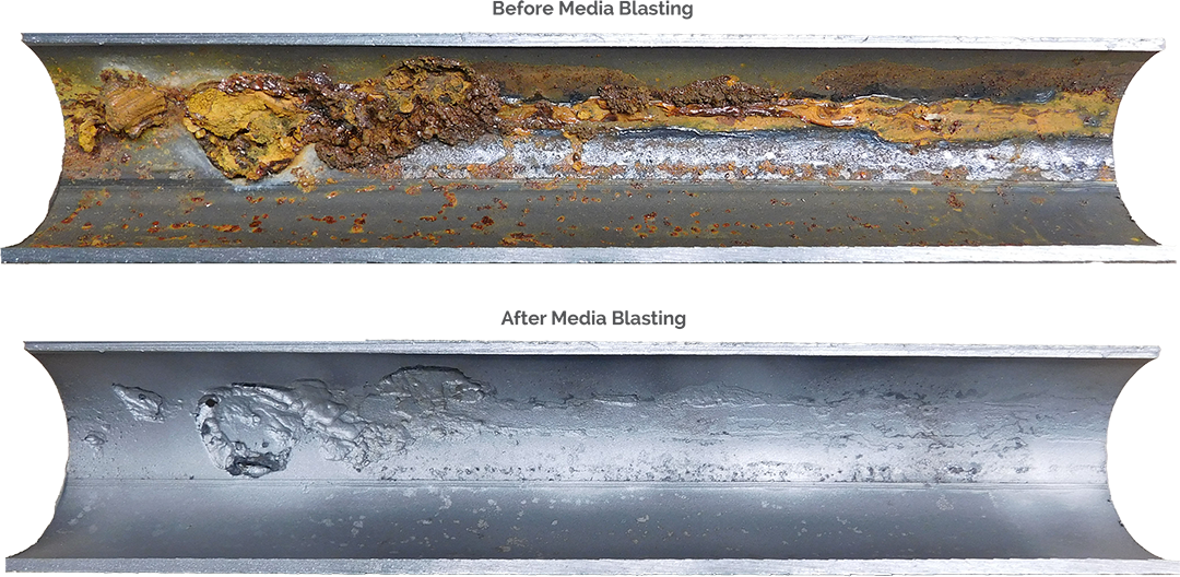 Pipes before and after media blasting.