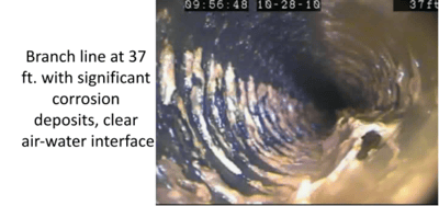 Branch line at 37 ft with significant corrosion deposits