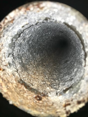 Galvanized pipe with corrosion.